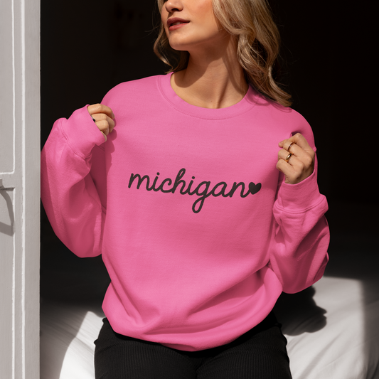 Michigan Has My Heart Sweatshirt on woman